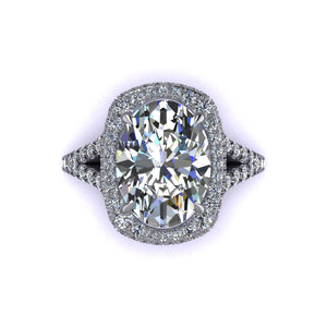 Elongated Cushion Double Edge Halo Featuring Diamond Basket and Cathedral Style Split Shank